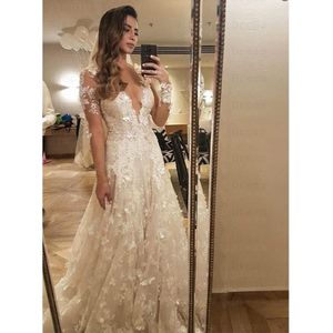 Plunge in to an elegance Champagne Wedding Dress
